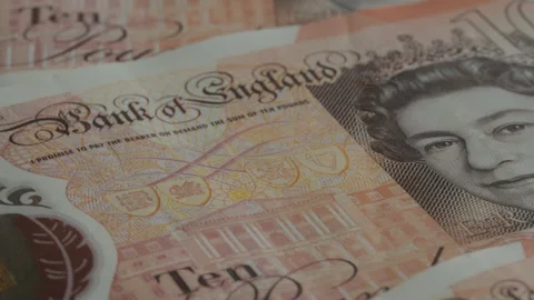 British 10 Pound notes rotating macro video Stock Footage 279884351