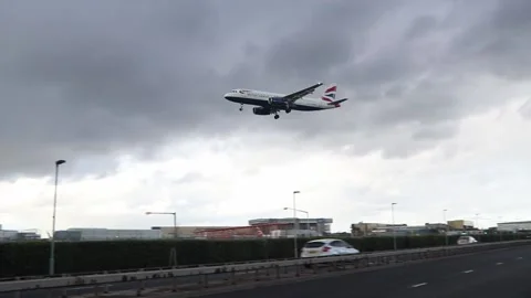 British Airways aircraft landing at London Heathrow Airport Stock Footage