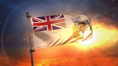 British Antarctic Territory Flag Backlit At Beautiful Sunrise Loop Slow Mot.. Stock Footage 76258400