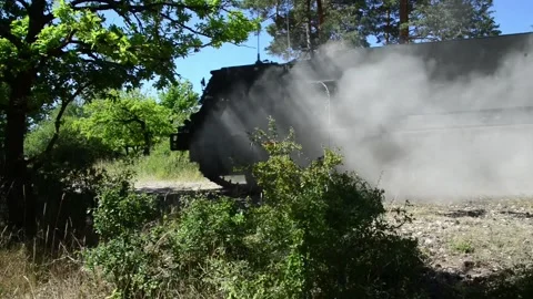 British Army Multiple Launch Rocket System stopping on dirt road Stock-Footage 201861804