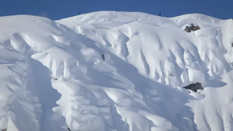 British Columbia, Canada - 2017: A freestyle skier perform trick and jump Stock Footage 136482653