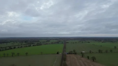 British Countryside with Train Track Through the Landscape in 4K Stock Footage 297024107