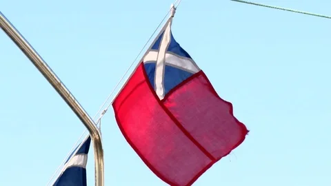 British Ensign with Scottish Saltire on back of boat 動画素材 77753889