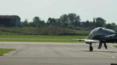 British Fighter Jet moving down runway Stock Footage 41346978
