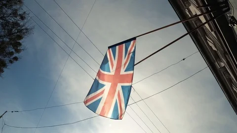 British Flag develops against the sky Stock Footage 124985759