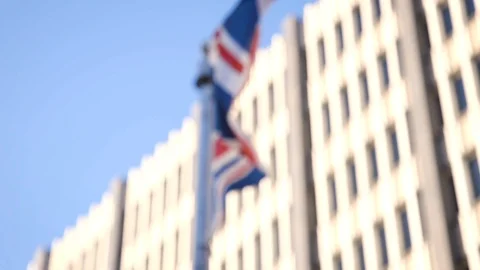 British flag flies violently in high wind close up Stock Footage 104168302