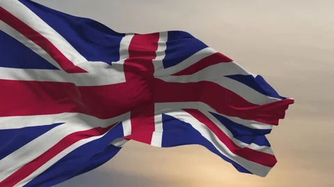 British flag fluttering in the wind against the background of evening clouds Stock Footage 128824498