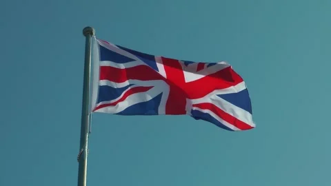 A British flag is flying 動画素材 343385388