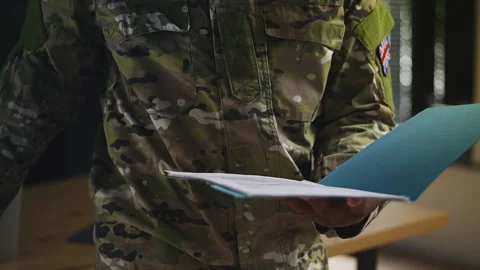 British intelligence agent photographs confidential documents, espionage Stock Footage 346639938