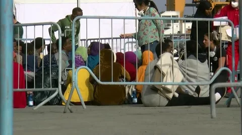 British navy give aid to immigrats in south italy Stock Footage 50061385