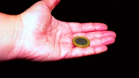 British pound coins put on a table on a white background Stock Footage 234142549