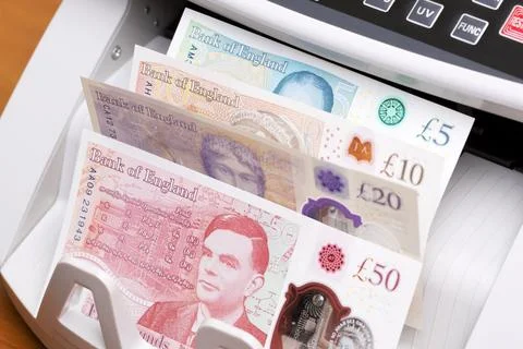 British pound in the counting machine Stock Photos
