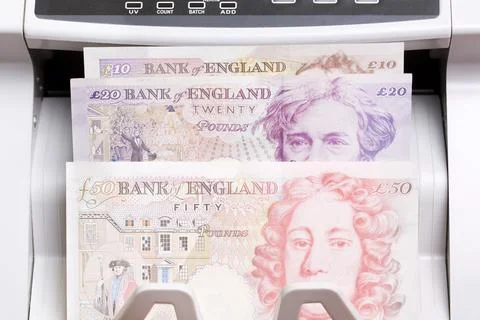 British pound in the counting machine Stock Photos