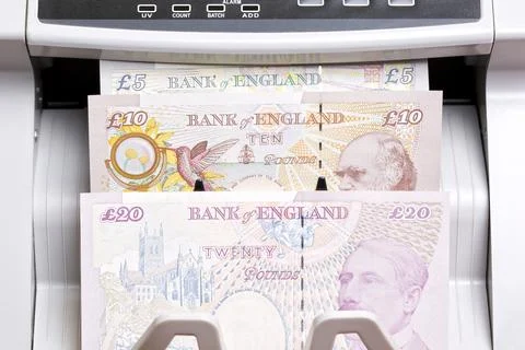 British pound in the counting machine Stock Photos