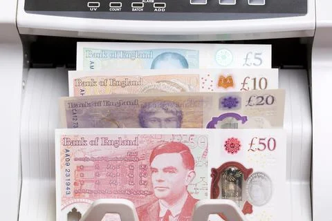 British pound in the counting machinej Foto stock