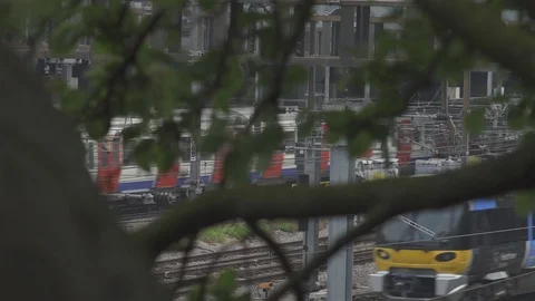 British rail train and underground train passing side by side. London Stock Footage 93209927