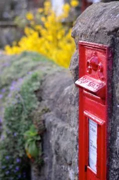 British Red Post Box in Wall Stock Photos