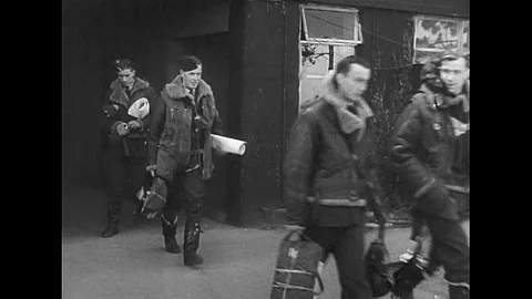 The British Royal Air Force bombs railroads and submarines in Bremen, during Stock Footage 115371338