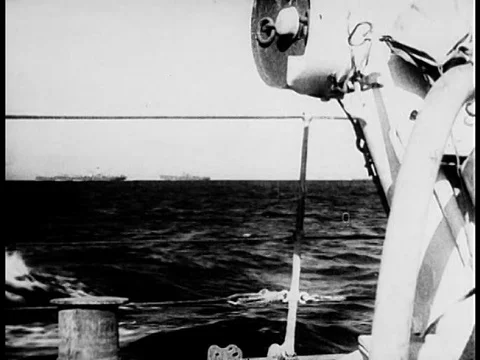 The British Royal Navy brings supplies to Tunisia and warplanes attack, during Stock Footage