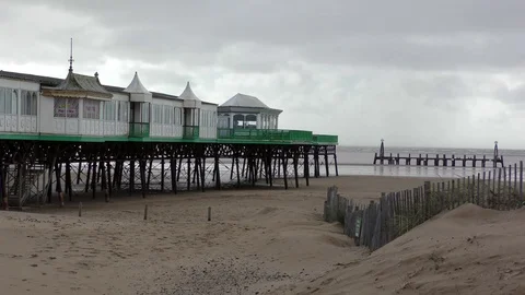 British seaside pier beach stormy sky Stock Footage 82574532