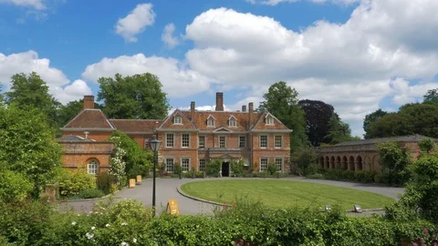 British Stately home, with surrounding architecture and gardens, drone aerial 4K Stock Footage 101137716