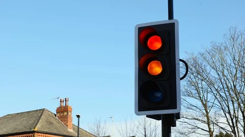 British Traffic Lights Changing From Red to Green Close Up Vídeo Stock 124796069