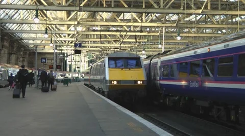 British Train Arriving At Glasgow Station Stock Footage