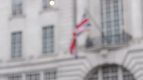 British Union Jack flag blowing in the wind during the day Stock-Footage 98754037