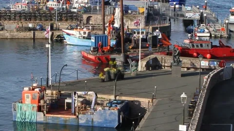 Brixham, Devon: Barge into harbour, Man and Boy statue (SPEEDED UP x4, MUTE) Stock Footage 142000654
