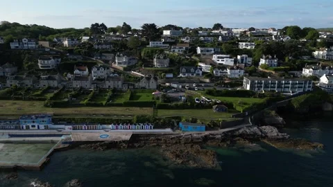Brixham, Devon, England: DRONE AERIAL VIEWS: Shoalstone pool, coastline &amp; houses Stock Footage 241442968