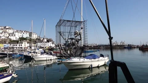 Brixham Devon England. Skeleton in a cage in harbour Stock Footage 133372435