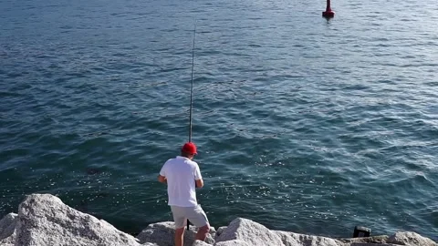 Brixham, devon. May 31, 2021. happy men fishing in brixham in devon. He sho.. Stock Footage 264345265