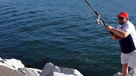 Brixham, devon. May 31, 2021. happy men fishing in brixham in devon. He sho.. Stock Footage 264352746