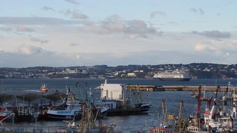 Brixham, Devon: One trawler coming in / another leaving the harbour Stock Footage 141445612
