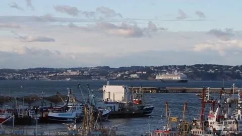 Brixham, Devon: Speeded up sequence (x16), Trawler in / out of port (MUTE) Stock Footage 141442128