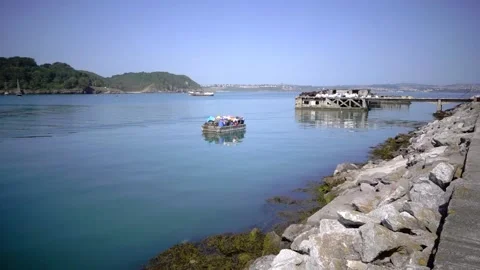 Brixham Harbour, Devon England. The breakwater and features Stock Footage 133360054