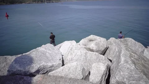 Brixham Harbour, Devon England. The breakwater and features Stock Footage 133361500