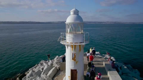 Brixham Harbour Lighthouse from a drone, Brixam, Devon, England Video stock 163186729