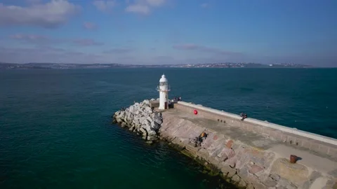 Brixham Harbour Lighthouse from a drone, Brixam, Devon, England Stock Footage 163215049