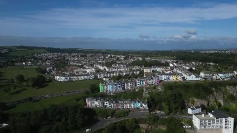 Brixham, South Devon, England: DRONE VIEWS: Pastel-coloured Victorian houses (3) Stock Footage 265004376