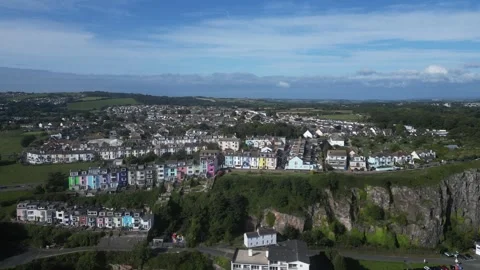 Brixham, South Devon, England: DRONE VIEWS: Pastel-coloured Victorian houses (2) Stock Footage 265019160
