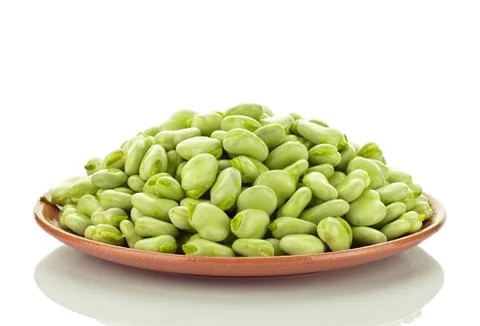 Broad beans on a platter Stock Photos
