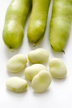 Broad beans on white background Stock Photos