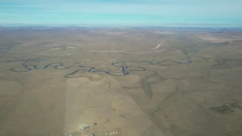 Broad River Winding Through Northern Grassland Stock Footage 344035436