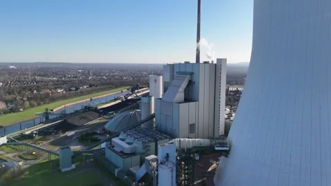 Broad view of power station with giant cooling tower Stock Footage 337483939