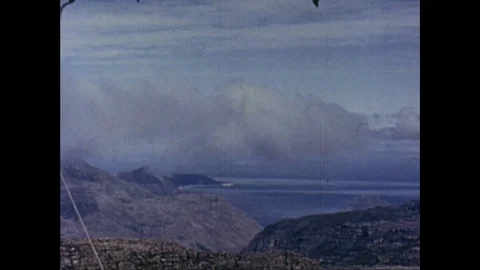 A broad view from the top of a mountain on a cloudy day, south africa, 1939 Stock Footage 132320296