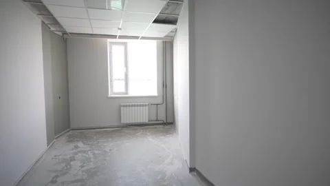 Broad windows dominate airy interior of building in progress Vídeo Stock 311386885