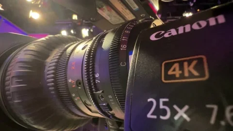 Broadcast Camera lens in a television studio Stock Footage 229138552