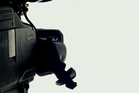 Broadcast Camera on white BG rotating Stock Footage 98311549
