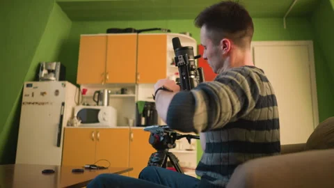 Broadcast director adjusting camera and microphone ready for production Vídeo Stock 317563981